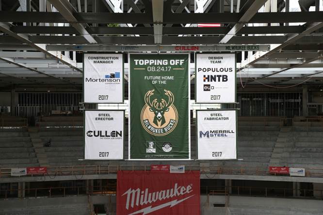 Three banging Banners in the Milwaukee Bucks Arena.