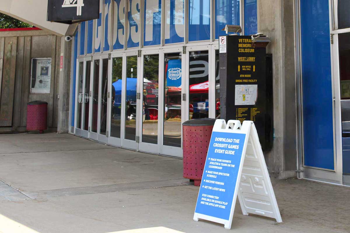 A-Frame plastic signage displayed outside the front door of an event center.