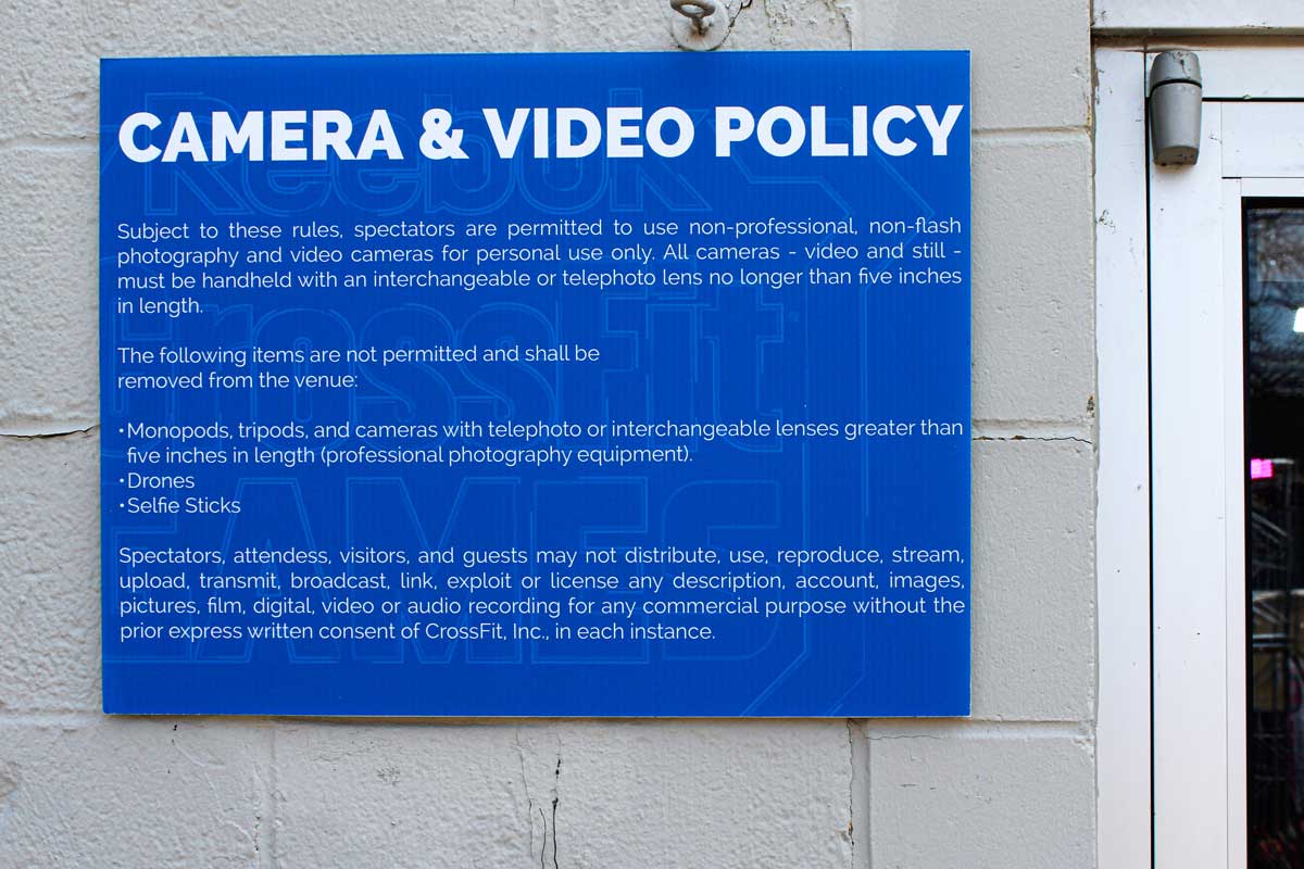 A horizontally hung sign displaying text "Camera and Video Policy".