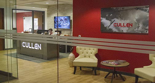 JP Cullen lobby wall photographed through a glass wall, embellished with semi-transparent window film.