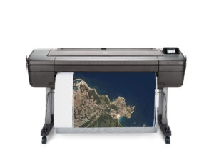 HP® DesignJet® Z9 Series Printer front-facing view printing a high-resolution aerial map with coastline and city detail.