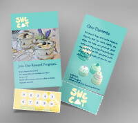 Cardstock with illustrations and text, displaying tear-away pieces at the bottom on a gray background.