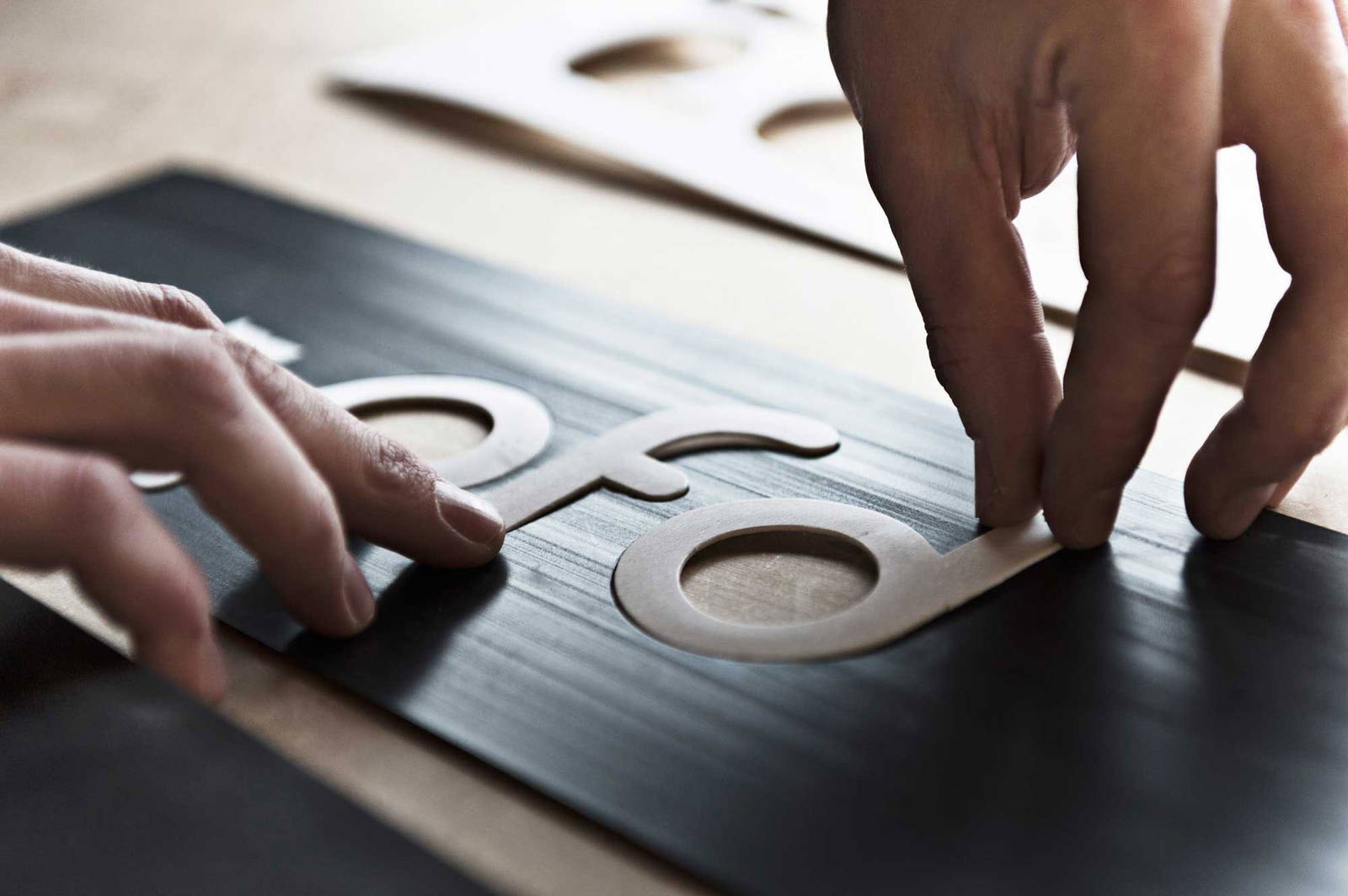 Laster cut letter signage.
