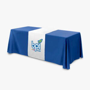 Dark blue table cover with a white table runner displaying the blue and white BPI Color logo.