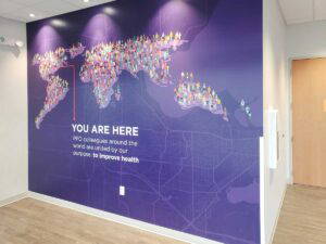 Purple adhesive wall fabric, displaying a world map.