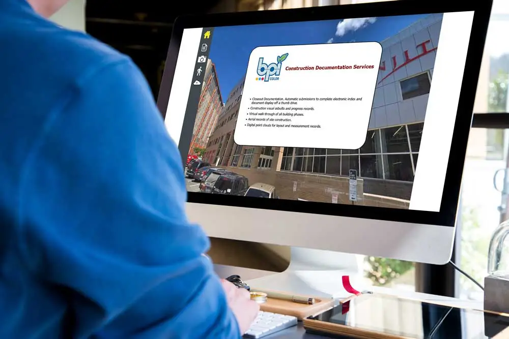 Close-Out Docs software on a desktop screen showing BPI Color's construction documentation interface with a digital photo of a project site and service bullet points.