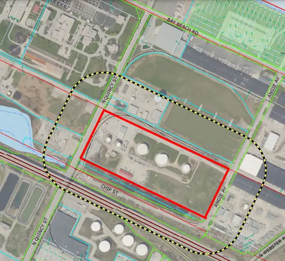 BPI Color's 2024 Year in Review 5 Green Bay Smart Infrastructure site plan showing an industrial area outlined in red near Chip Street and North Quincy Street, overlaid with utility and zoning data.