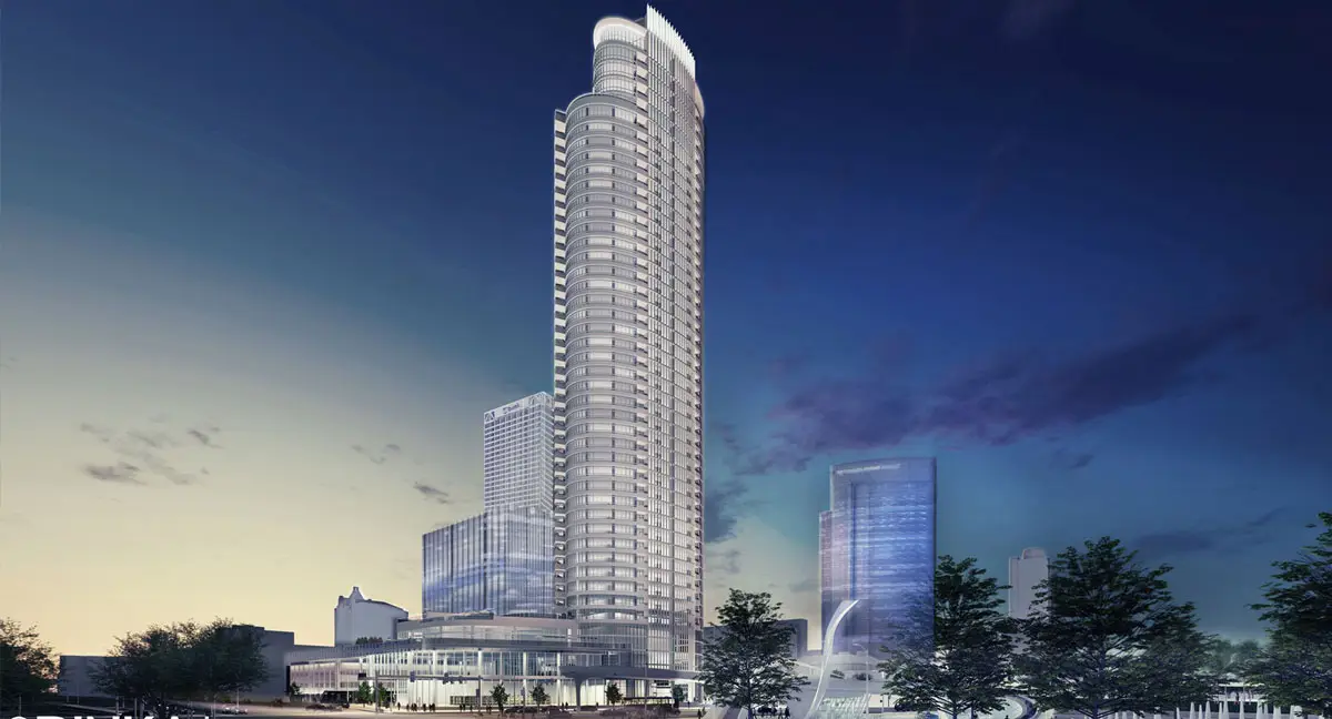 BPI Color's 2024 Year in Review 1 Couture Milwaukee Wisconsin Findorff rendering of a modern, high-rise residential tower illuminated at dusk, symbolizing downtown growth and urban development.