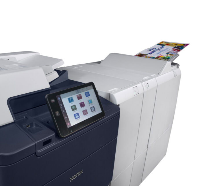 Xerox® PrimeLink® C9200 Printer close-up showing touchscreen control panel and extended output tray delivering full-color print on specialty media.