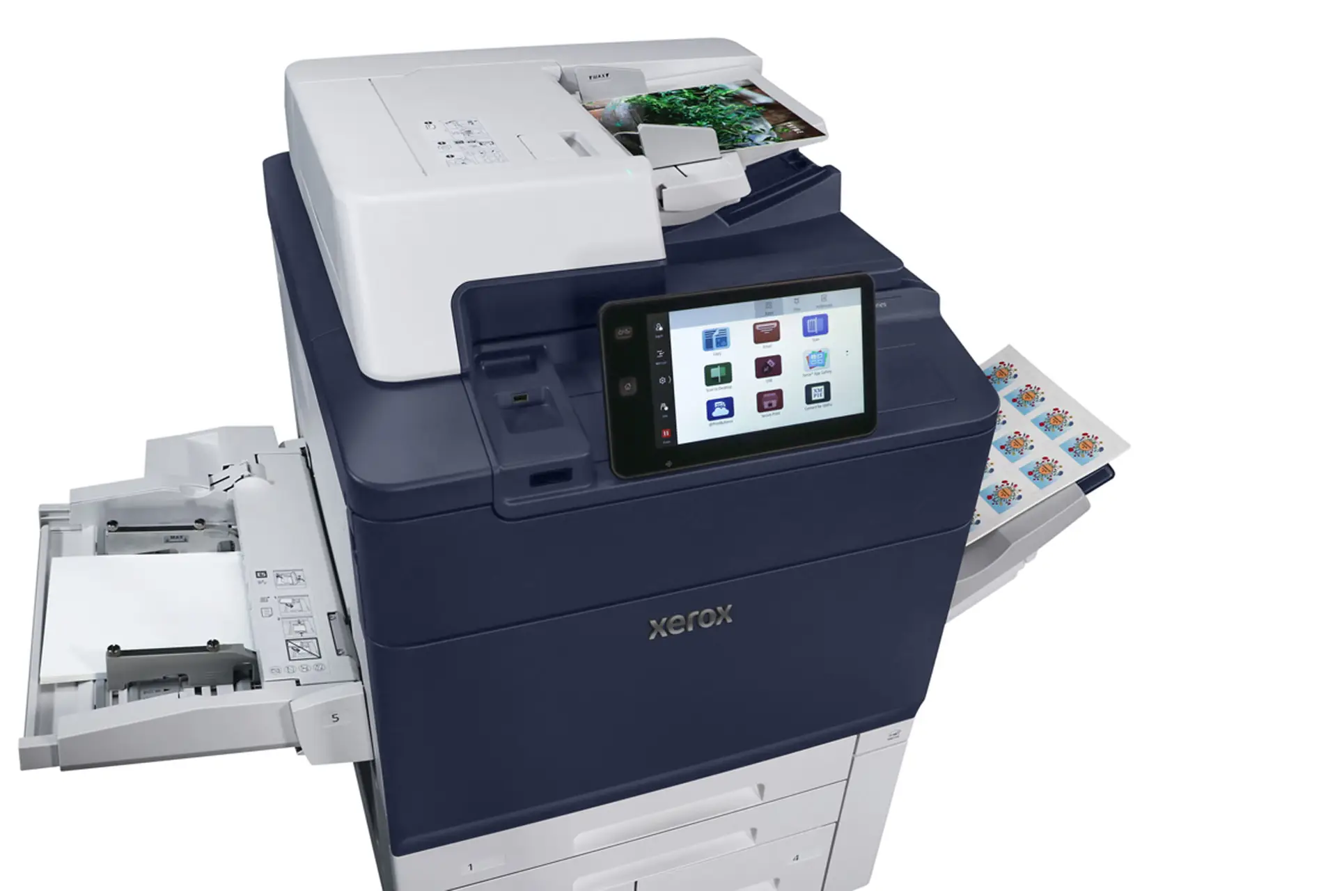 Xerox® PrimeLink® C9200 Series 2 Xerox® PrimeLink® C9200 Printer with touchscreen display and printed graphics emerging from the output tray.