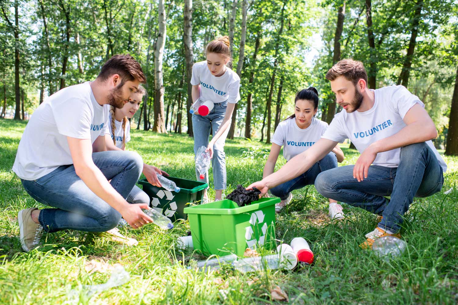 Promotional Products for Your Next Event 9 Group of people in matching shirts cleaning up plastic waste.