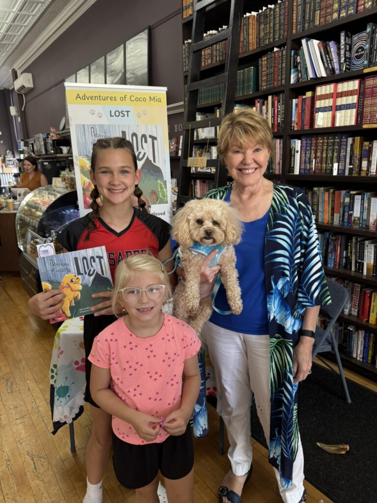 From Crisis to Courage: Mary Thompson & Adventures of Coco Mia - LOST! 7 Stand up banner at library book signing