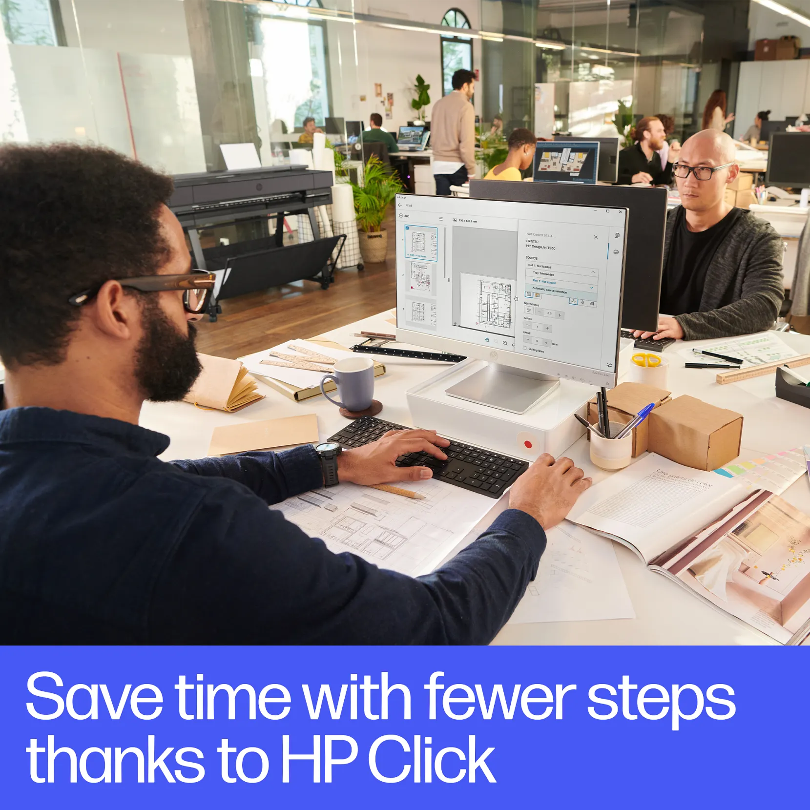 HP DesignJet XT850 4 HP Designjet T850 printer plotter with MFP option black in an office setting with a professional at a desk looking at line drawings no his computer getting ready to print